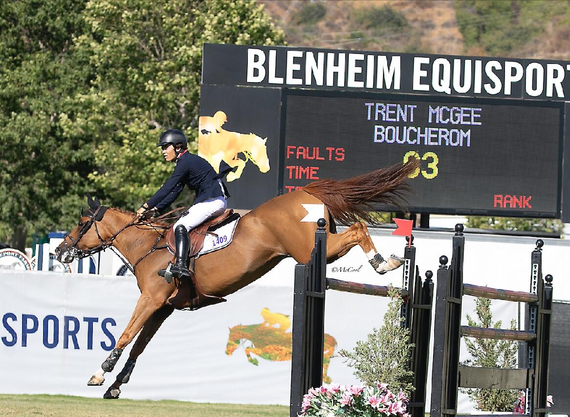 Nicole Haunert leads the victory gallop aboard Concolue