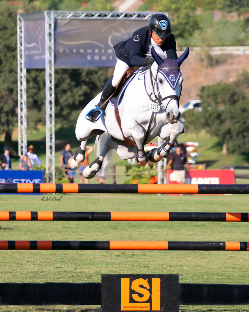 Nicole Haunert leads the victory gallop aboard Concolue