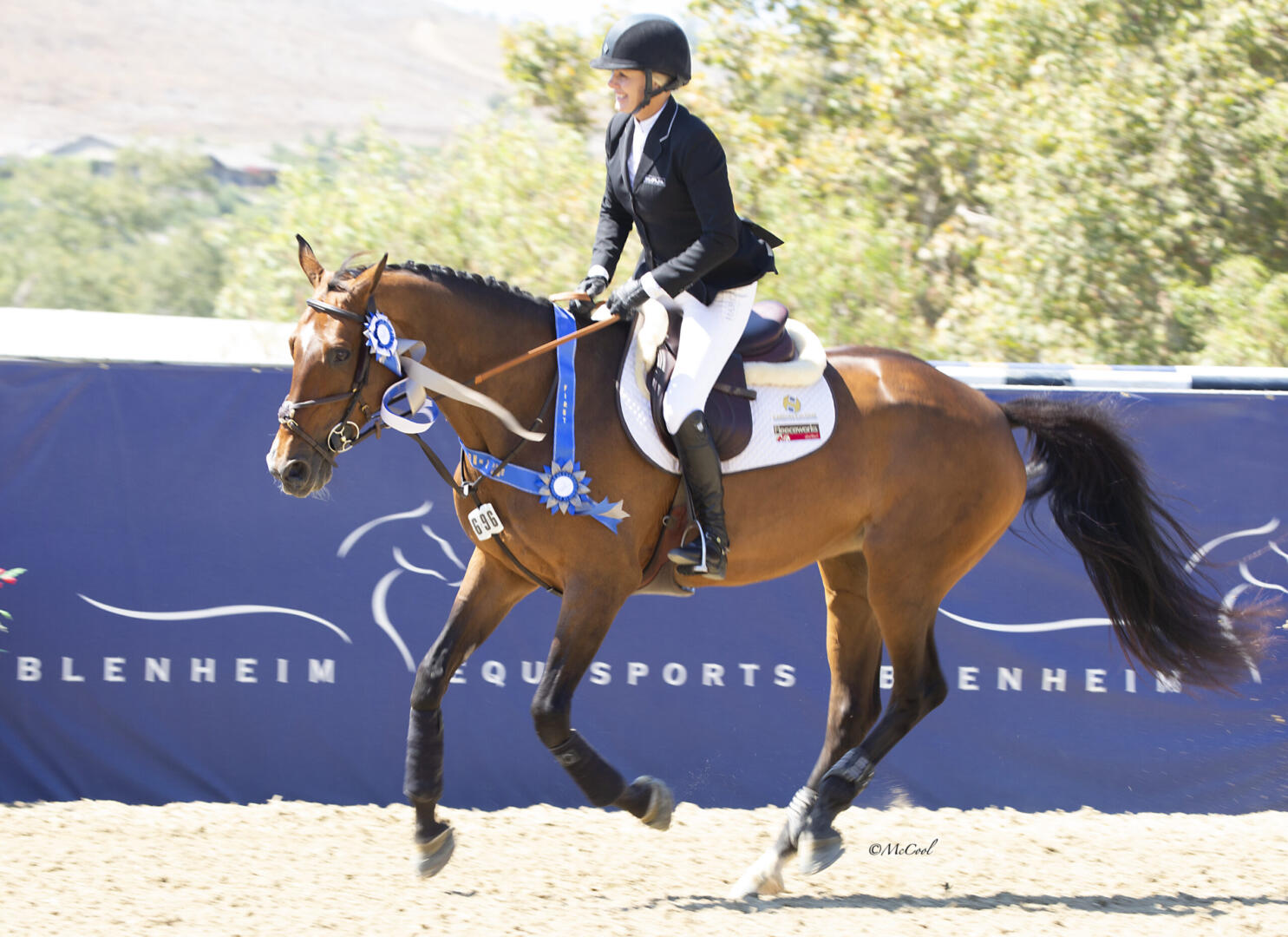 Nicole Haunert leads the victory gallop aboard Concolue