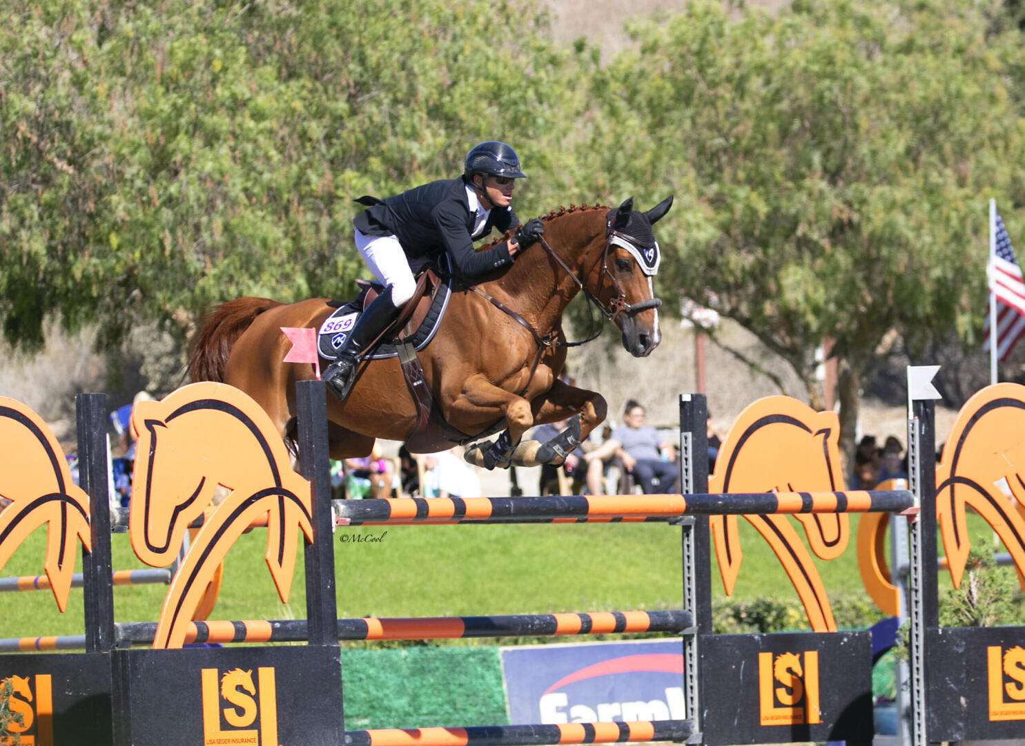 Nicole Haunert leads the victory gallop aboard Concolue