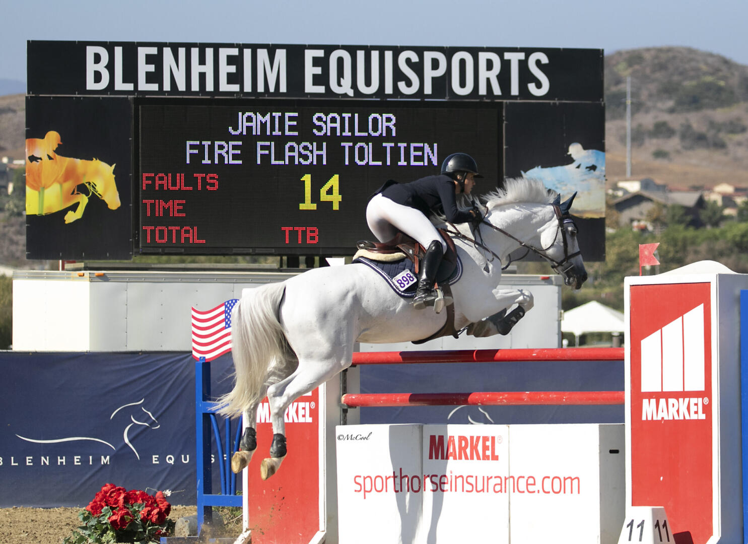 Nicole Haunert leads the victory gallop aboard Concolue