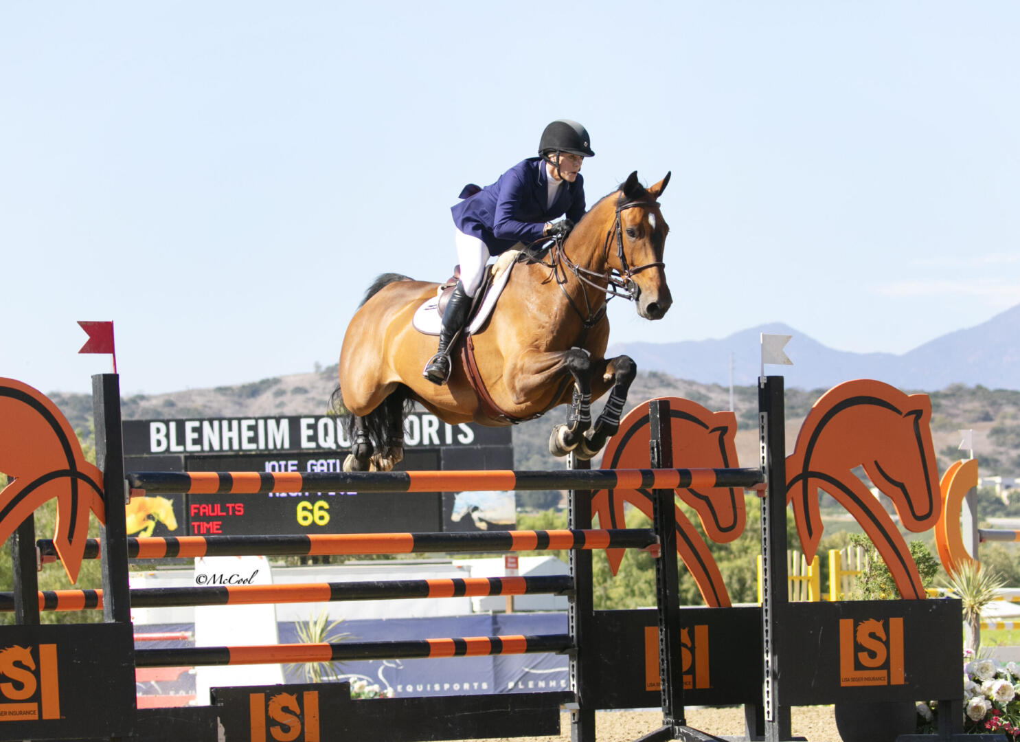 Nicole Haunert leads the victory gallop aboard Concolue