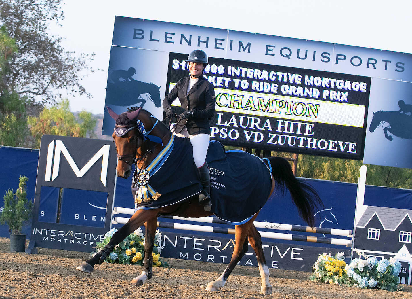 Laura Hite and Calypso VD Zuutheove are all smiles leading the victory gallop.